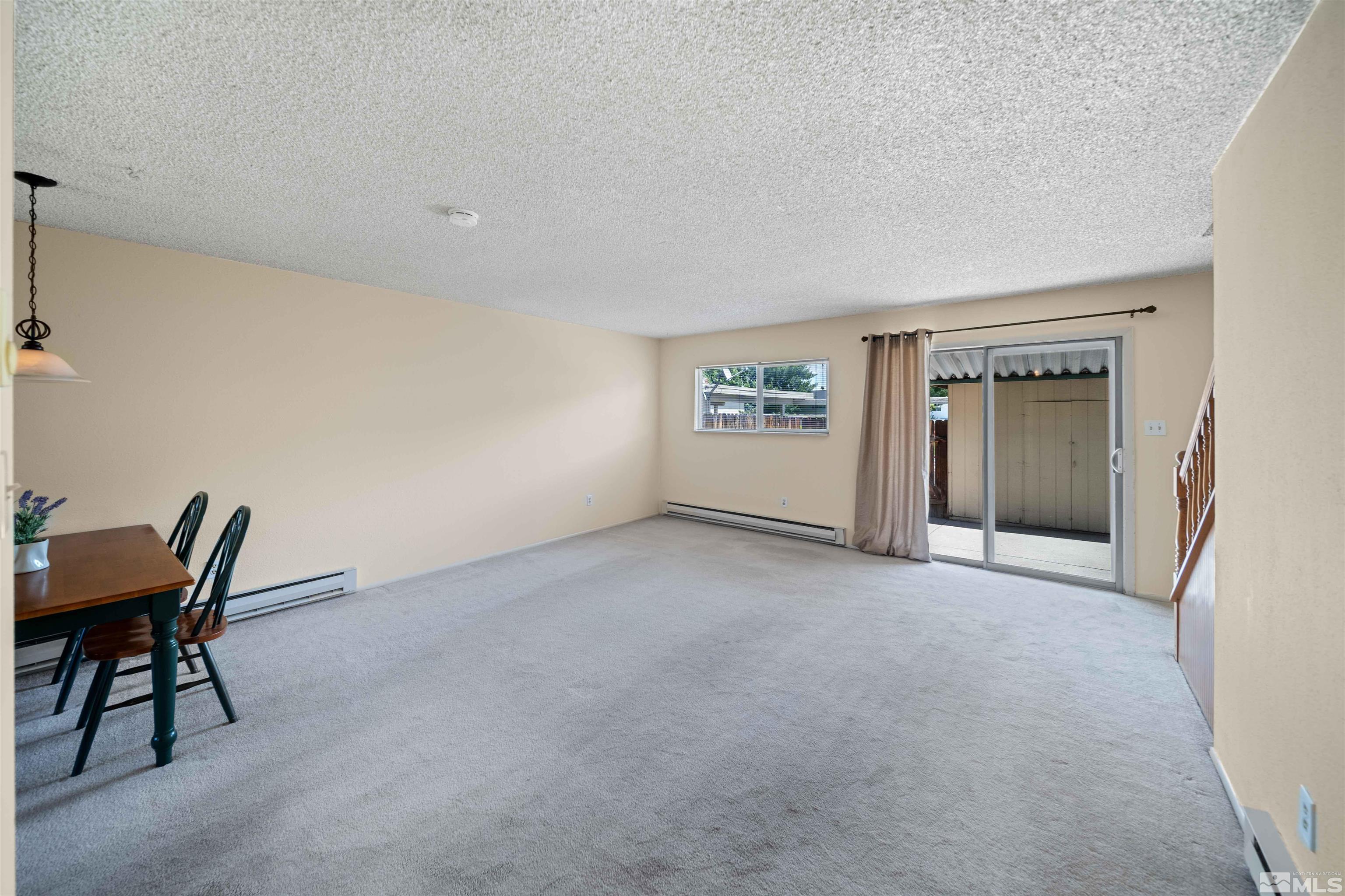 426 Smithridge Drive Reno, NV 89502 - Photo 8 of 20 a view of a livingroom with furniture and staircase