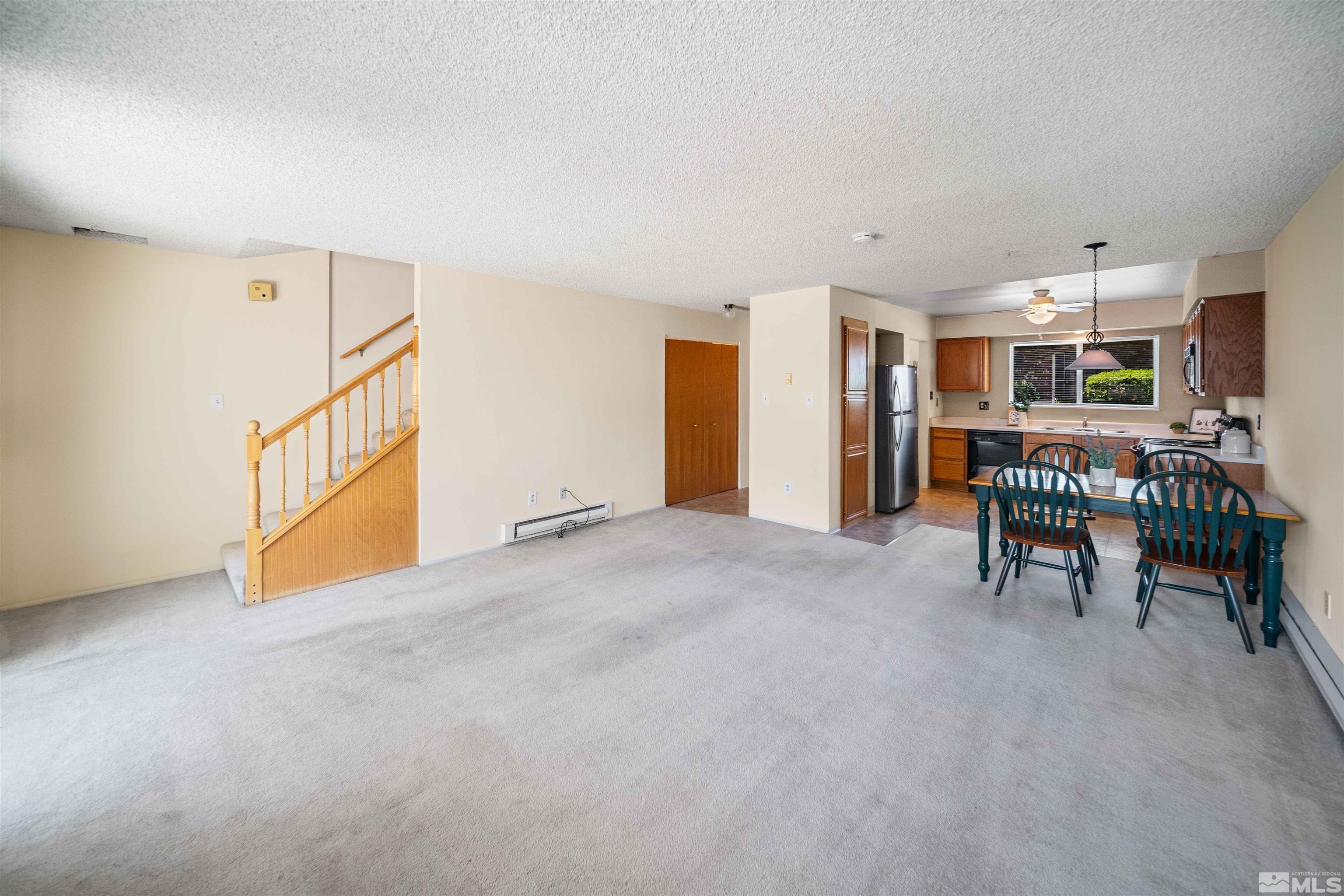 426 Smithridge Drive Reno, NV 89502 - Photo 9 of 20 a view of livingroom with furniture and chandelier fan