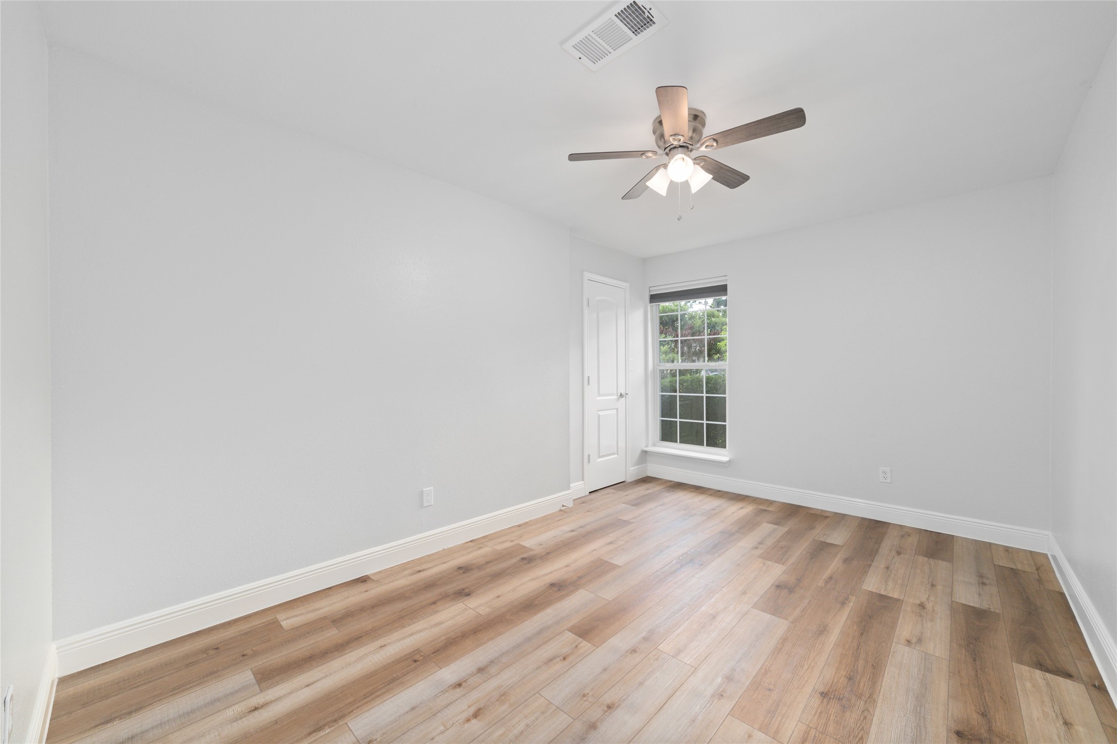 5922 Hummingbird Street Houston, TX 77096 - Photo 22 of 26 Fresh paint and updated flooring continue throughout the home, creating a cohesive feel from room to room. Move right in and start making memories.