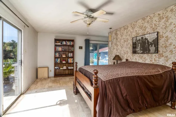 a bathroom with a toilet sink and shower