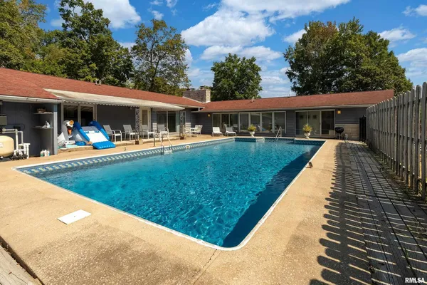 a view of outdoor space and backyard