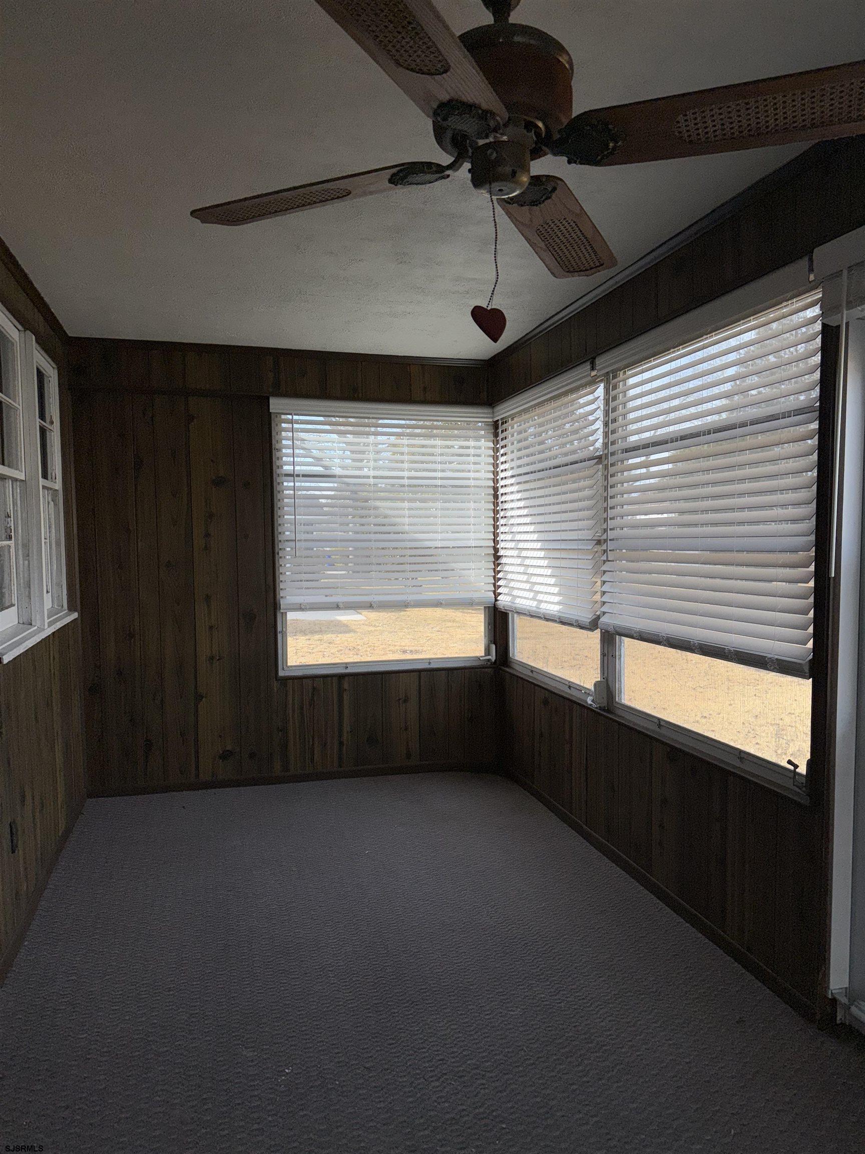 661 Grape Street Hammonton, NJ 08037 - Photo 5 of 14 a view of an empty room with a window