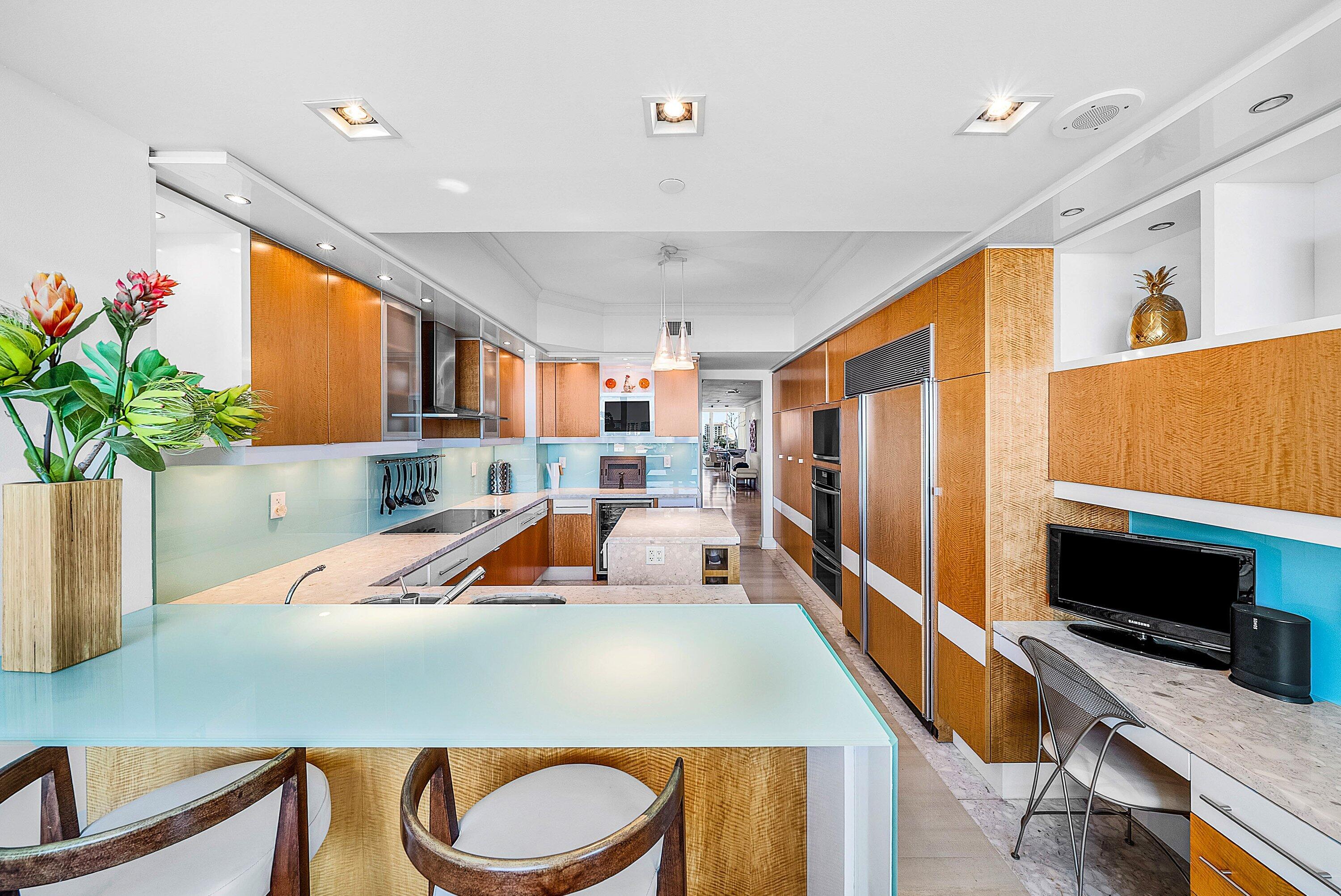 400 Southeast 5th Avenue, Unit 805N Boca Raton, FL 33432 - Photo 13 of 58 a room with furniture and a flat screen tv