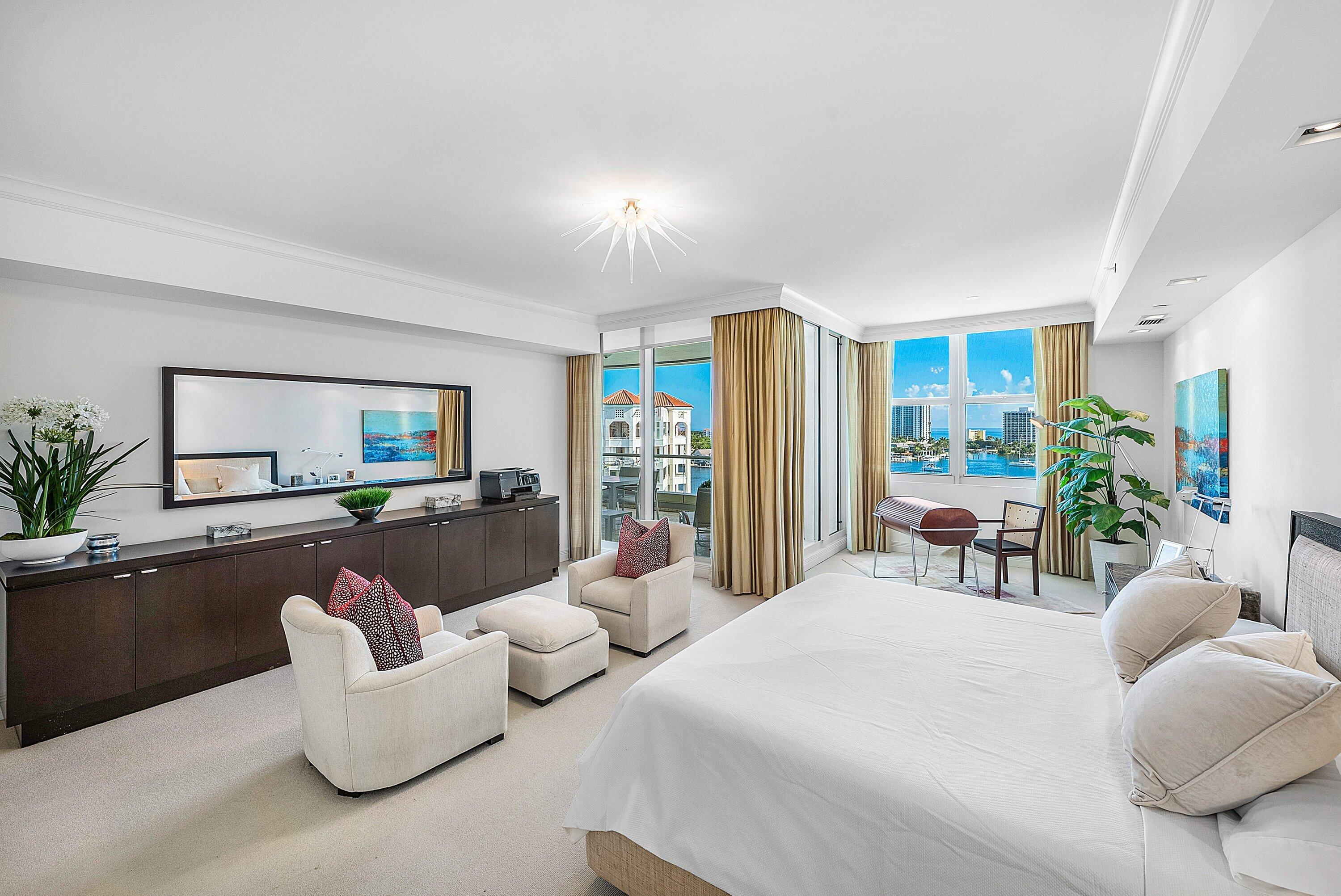 400 Southeast 5th Avenue, Unit 805N Boca Raton, FL 33432 - Photo 16 of 58 a bedroom with furniture and a large window