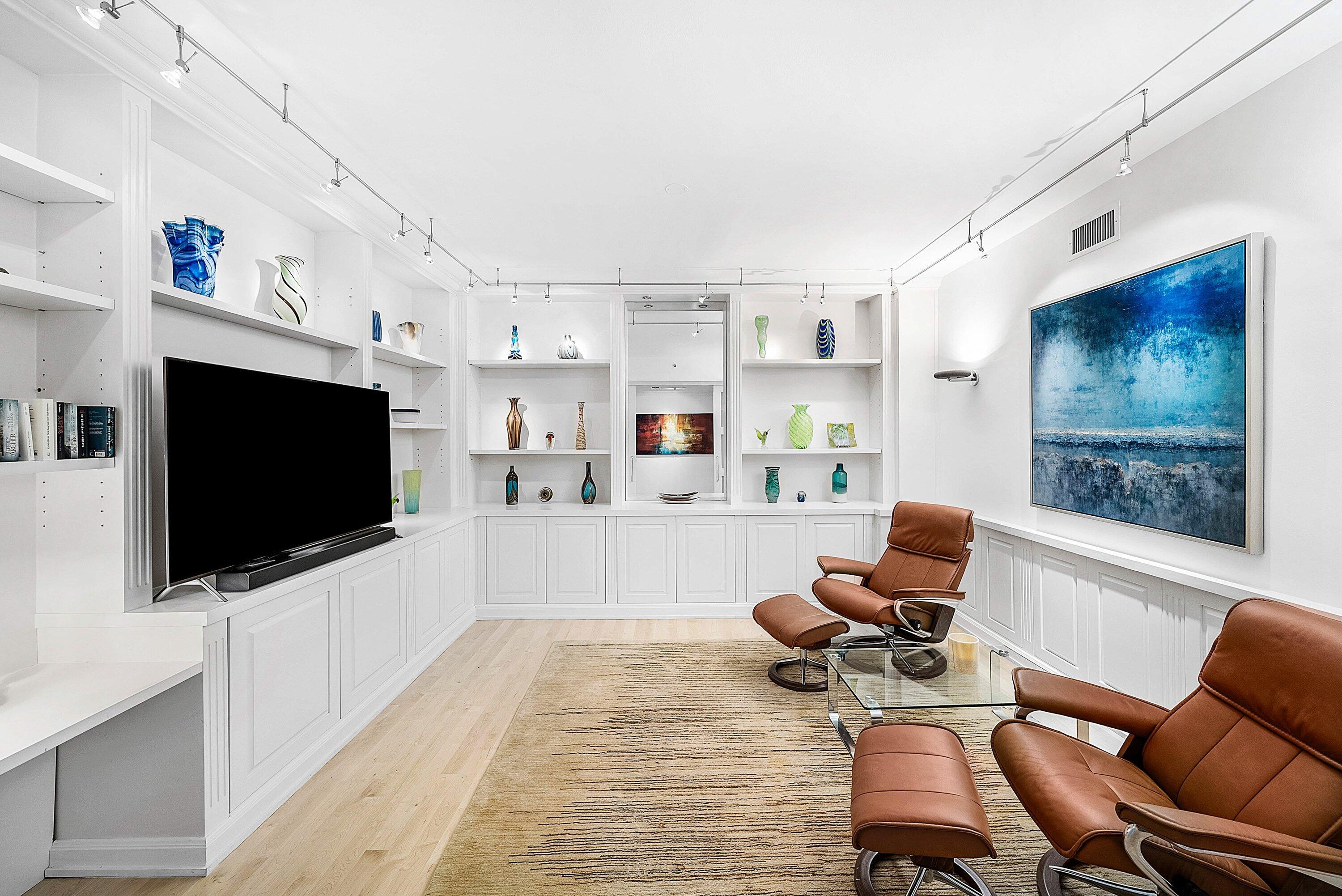 400 Southeast 5th Avenue, Unit 805N Boca Raton, FL 33432 - Photo 25 of 58 a living room with furniture and a flat screen tv