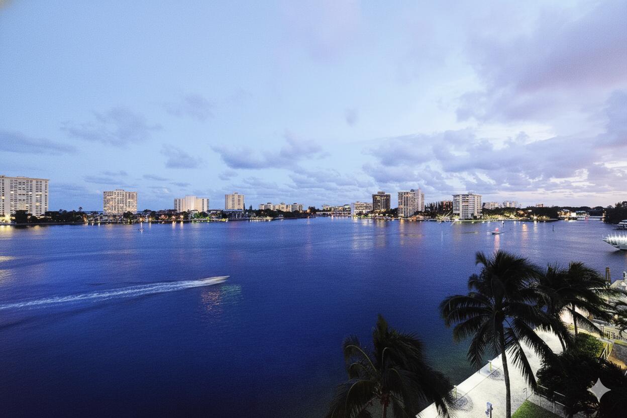 400 Southeast 5th Avenue, Unit 805N Boca Raton, FL 33432 - Photo 47 of 58 a view of a lake and houses in back