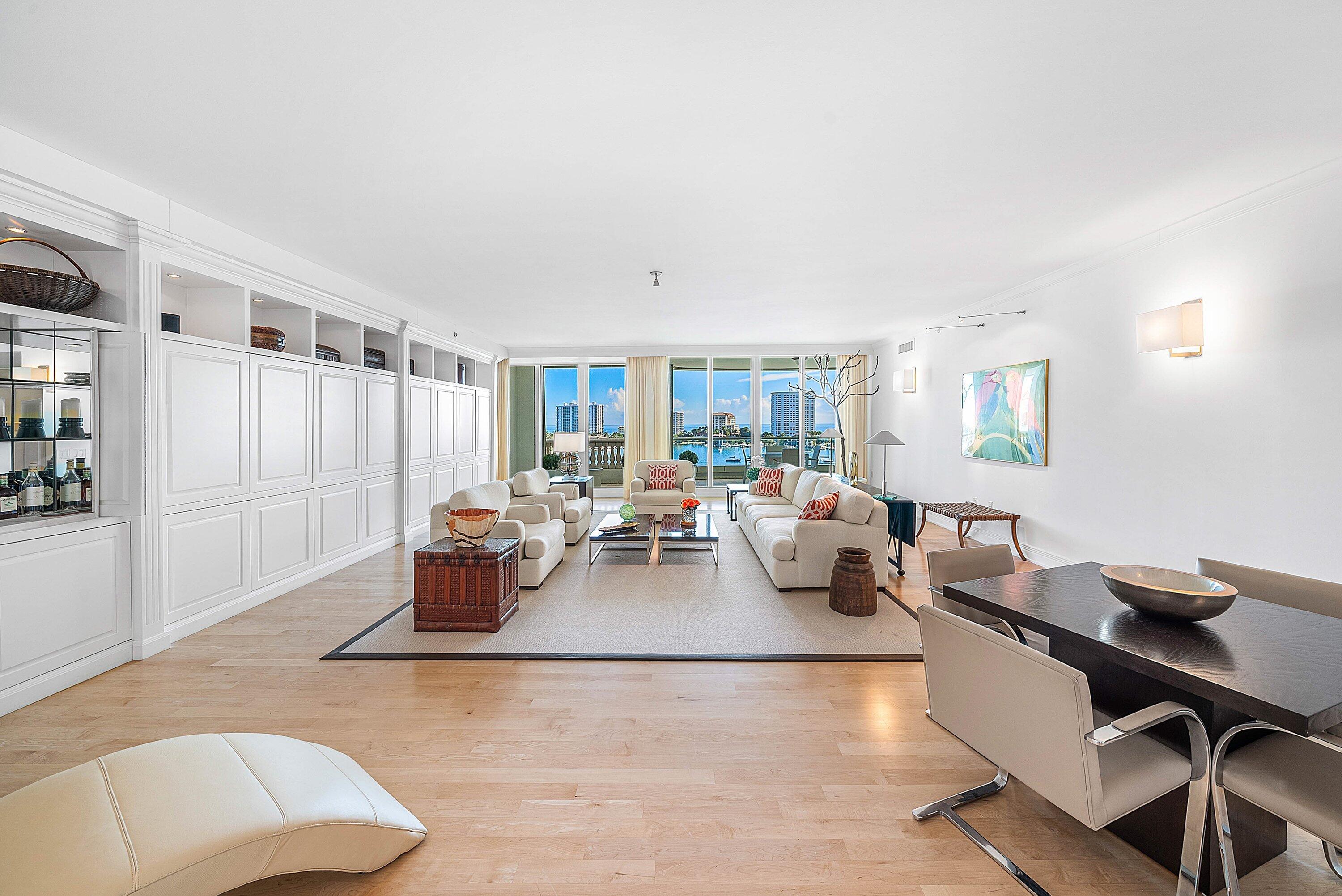 400 Southeast 5th Avenue, Unit 805N Boca Raton, FL 33432 - Photo 5 of 58 a living room with lots of furniture and a table