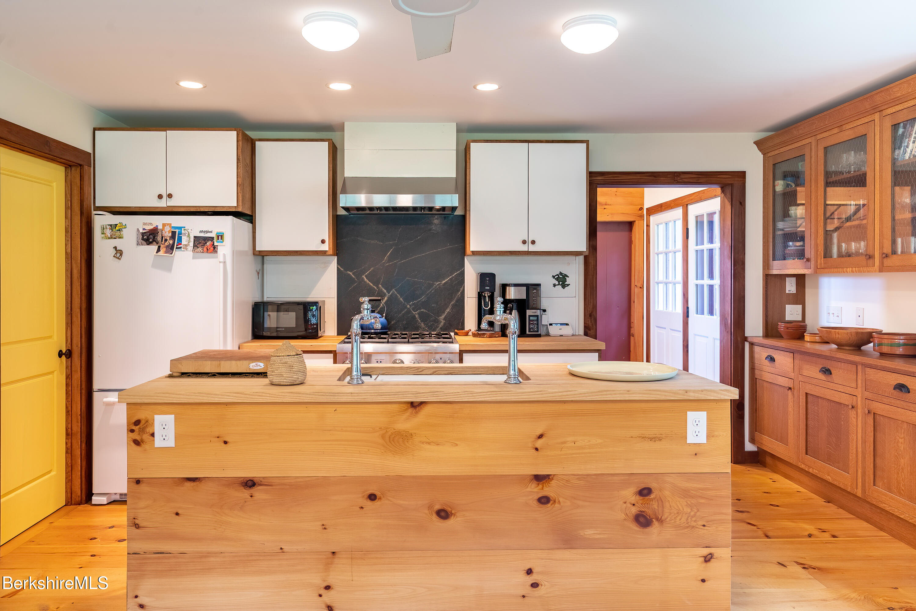 18 South Beech Plain Road Sandisfield, MA 01255 - Photo 18 of 32 a kitchen with stainless steel appliances granite countertop a sink and a stove