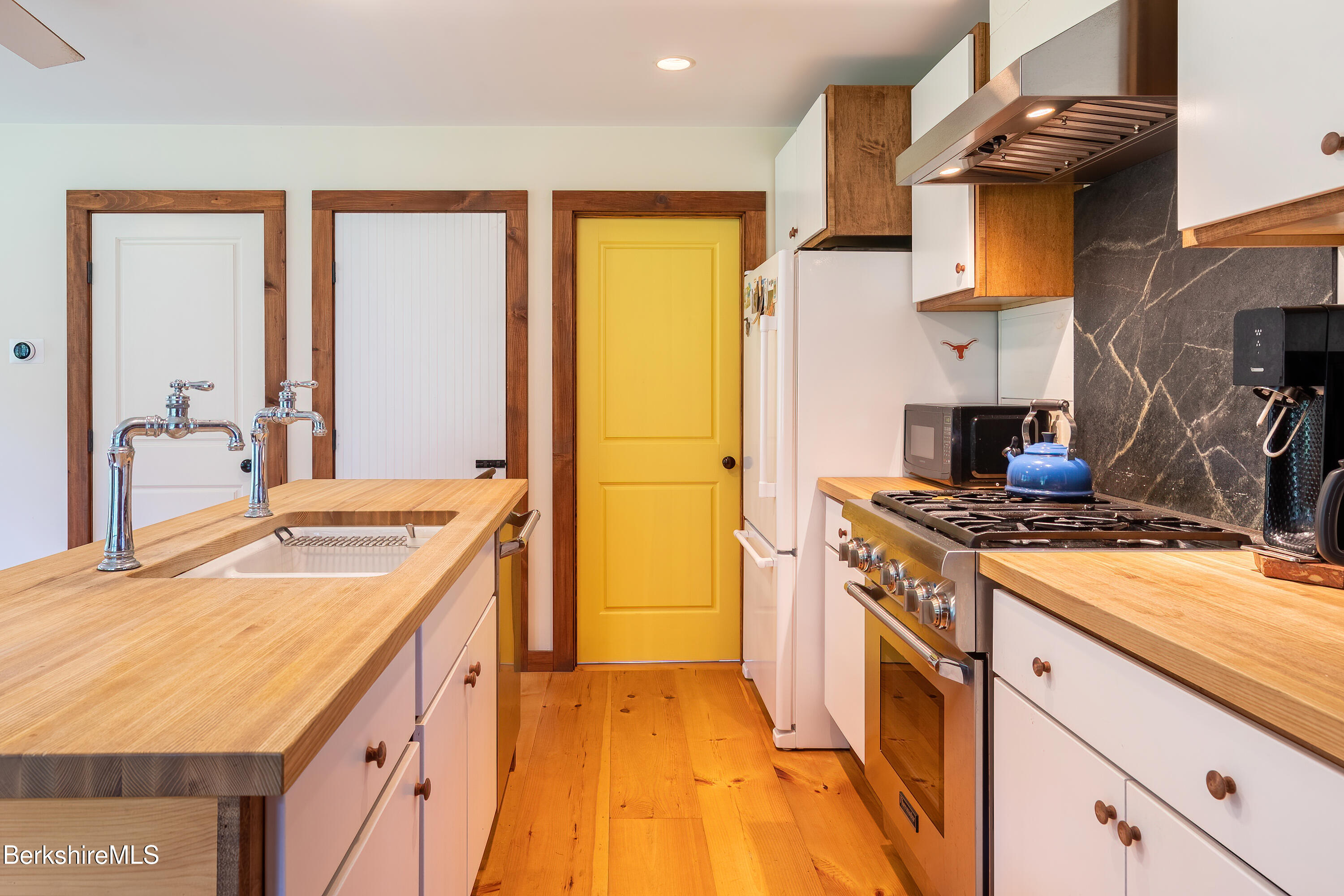 18 South Beech Plain Road Sandisfield, MA 01255 - Photo 19 of 32 a kitchen with a stove and a sink
