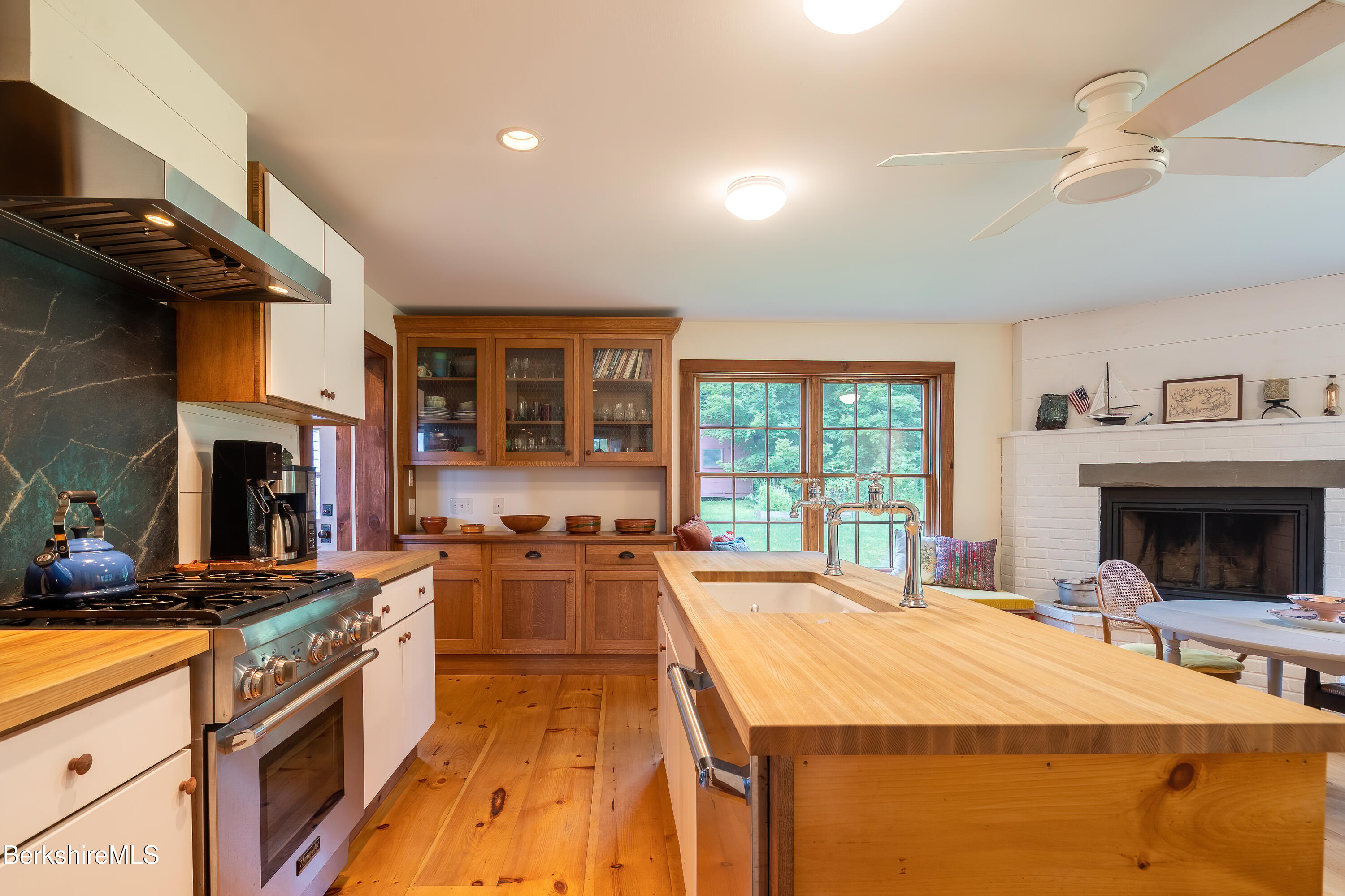 18 South Beech Plain Road Sandisfield, MA 01255 - Photo 20 of 32 a large kitchen with stainless steel appliances granite countertop a stove and a sink