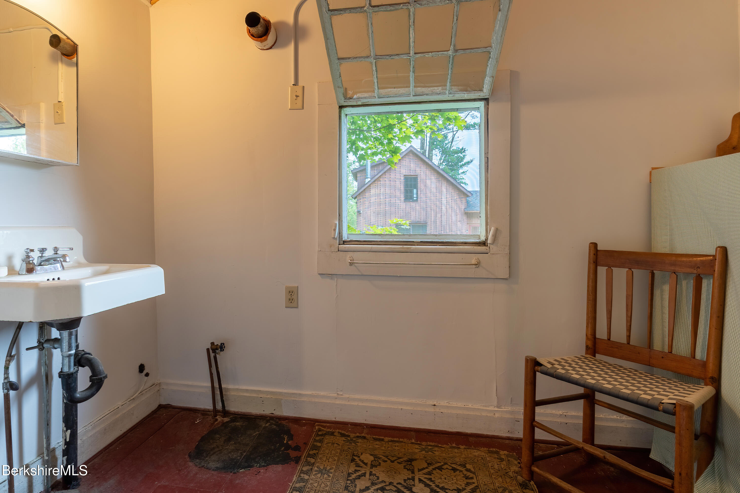 18 South Beech Plain Road Sandisfield, MA 01255 - Photo 28 of 32 a room with furniture and a window