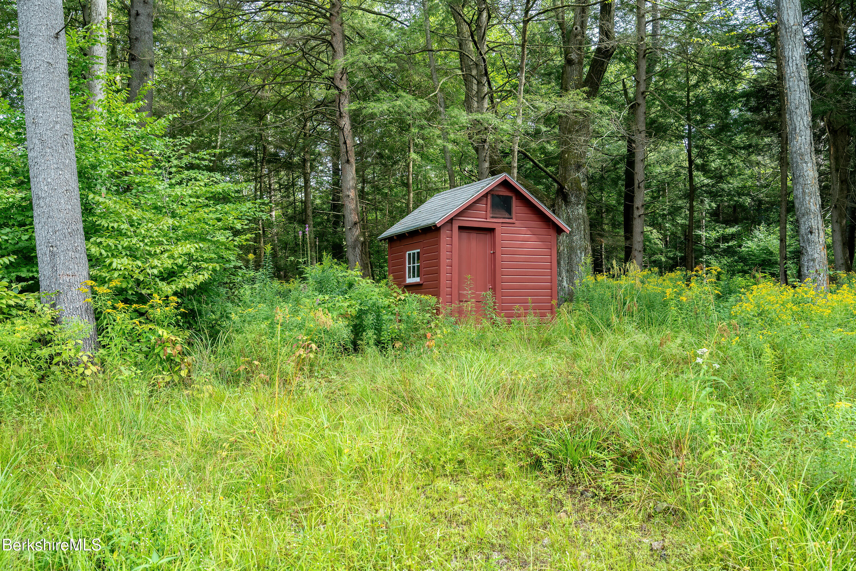 18 South Beech Plain Road Sandisfield, MA 01255 - Photo 29 of 32 a view of a garden with a house in the background