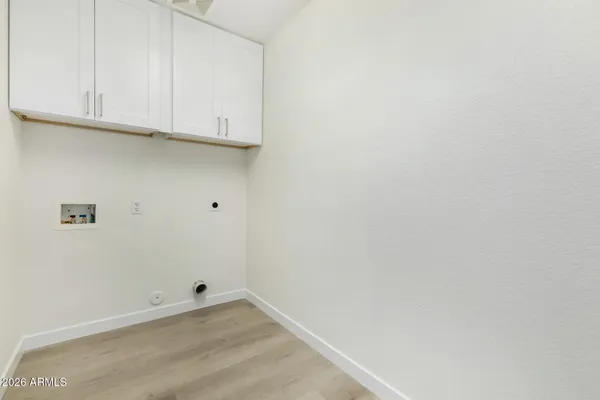 a view of room with cabinets