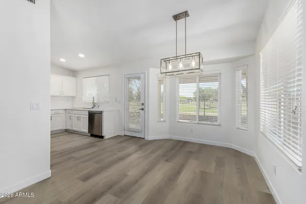 a view of a kitchen with windows