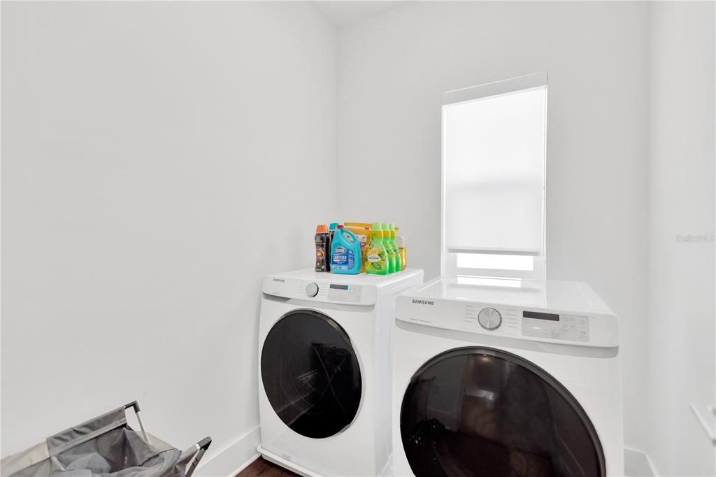 3100 West Paul Avenue, Unit 14 Tampa, FL 33611 - Photo 28 of 36 a utility room with dryer and washer