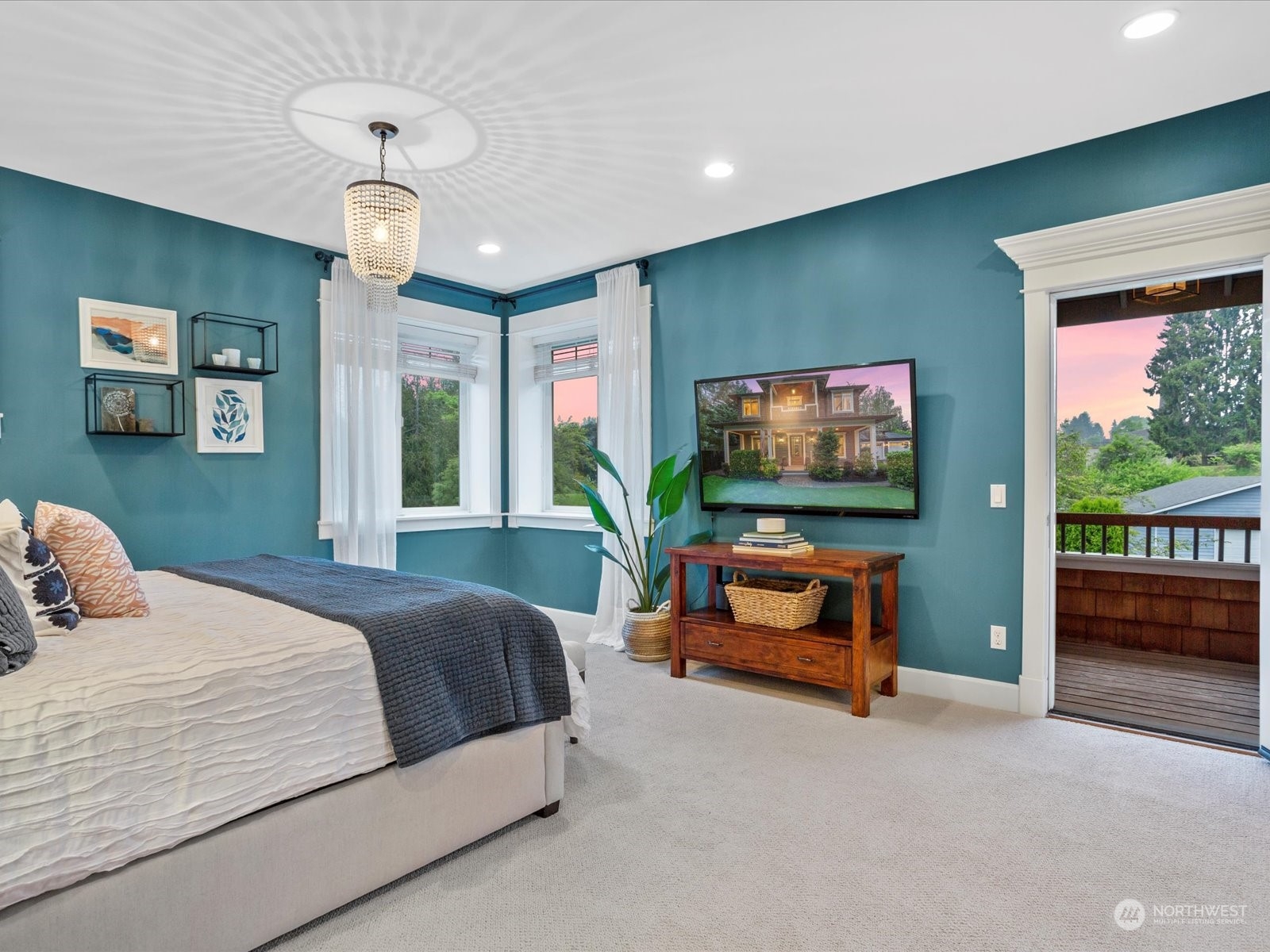 816 13th Street Snohomish, WA 98290 - Photo 21 of 34 a bedroom with a bed and a flat screen tv