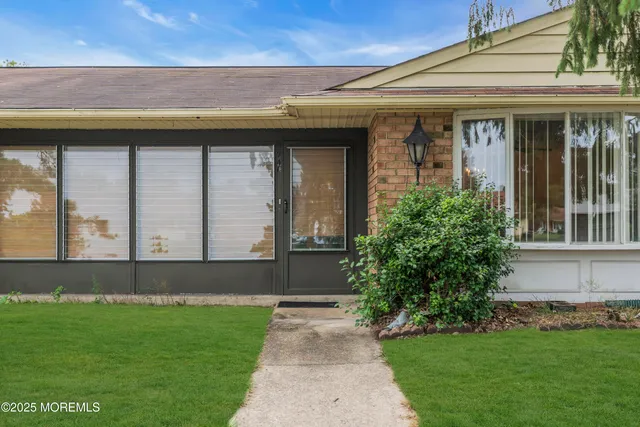 a front view of house with yard
