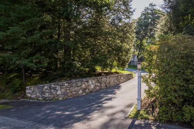 a view of a yard with an trees