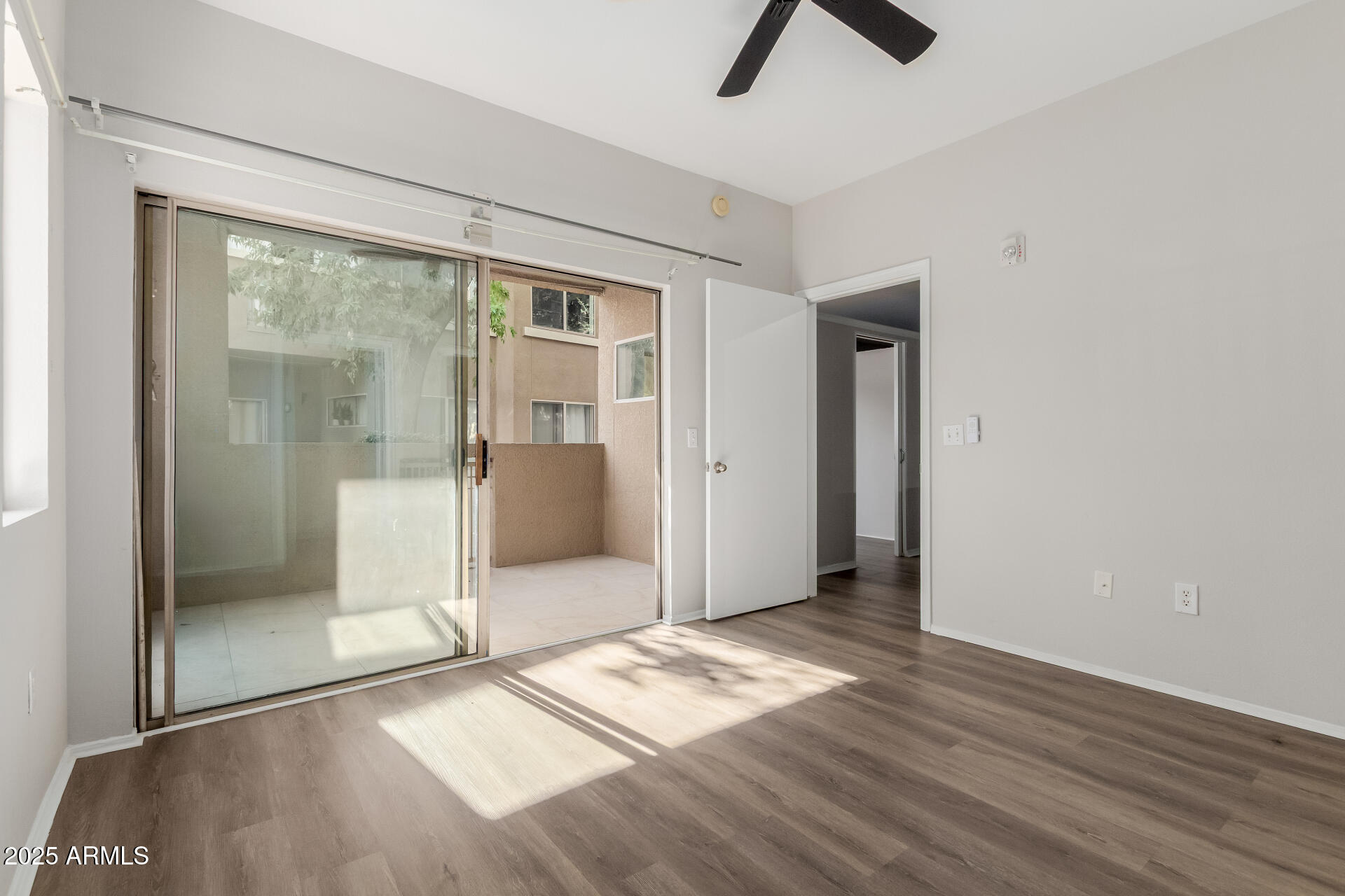 4644 North 22nd Street, Unit 1161 Phoenix, AZ 85016 - Photo 15 of 25 a view of workspace with wooden floor and window