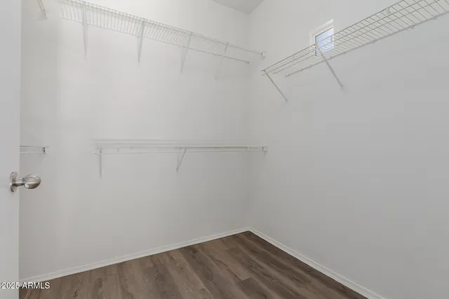 a view of a room with racks on the wall