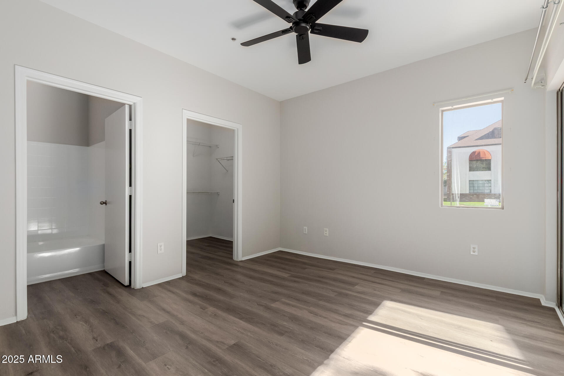 4644 North 22nd Street, Unit 1161 Phoenix, AZ 85016 - Photo 16 of 25 a view of an empty room and window