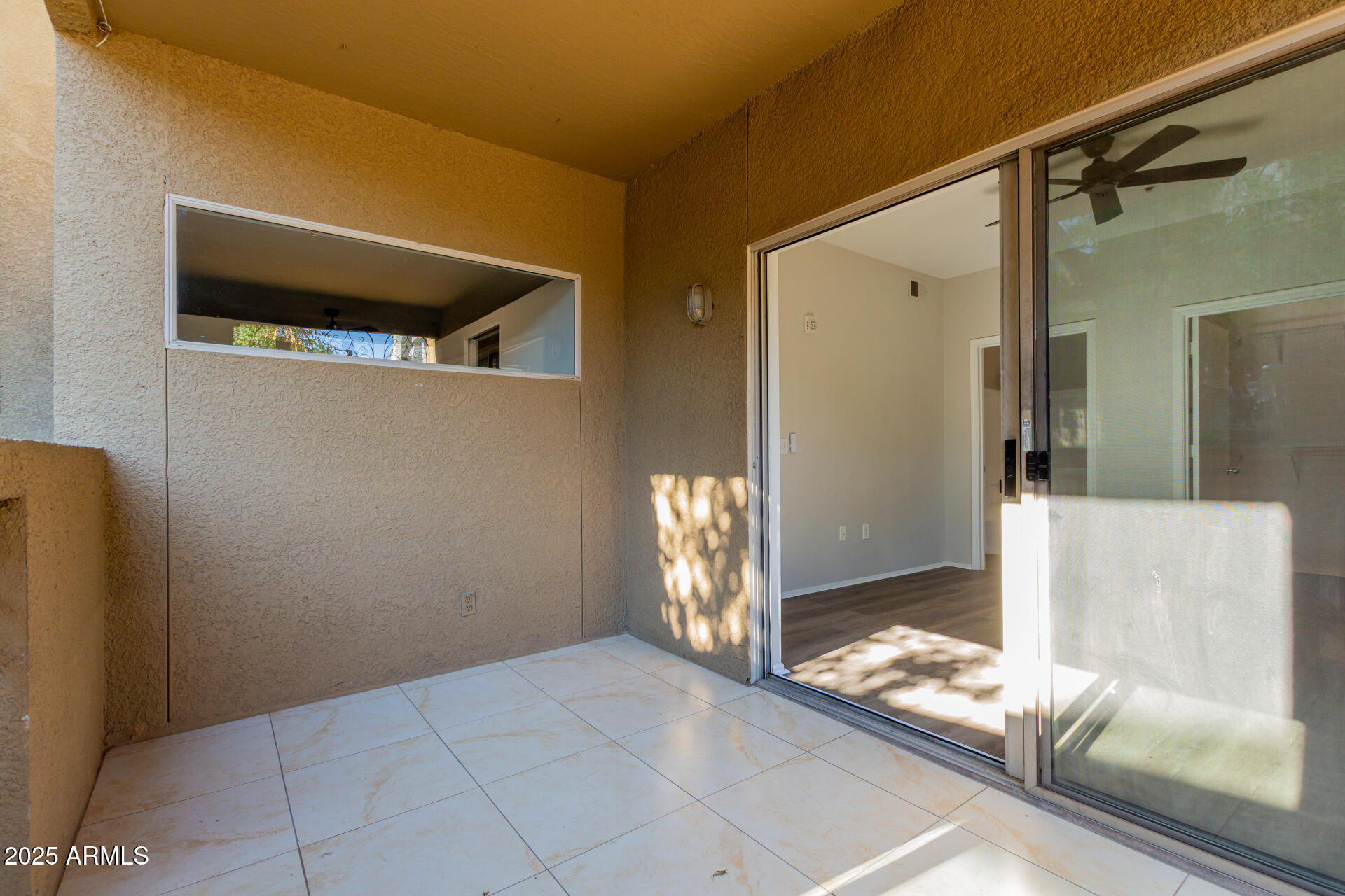 4644 North 22nd Street, Unit 1161 Phoenix, AZ 85016 - Photo 20 of 25 a view of an empty room and window
