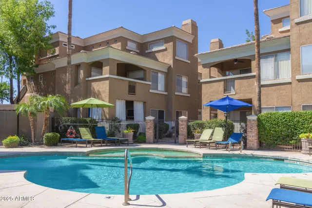 a view of a building with a yard