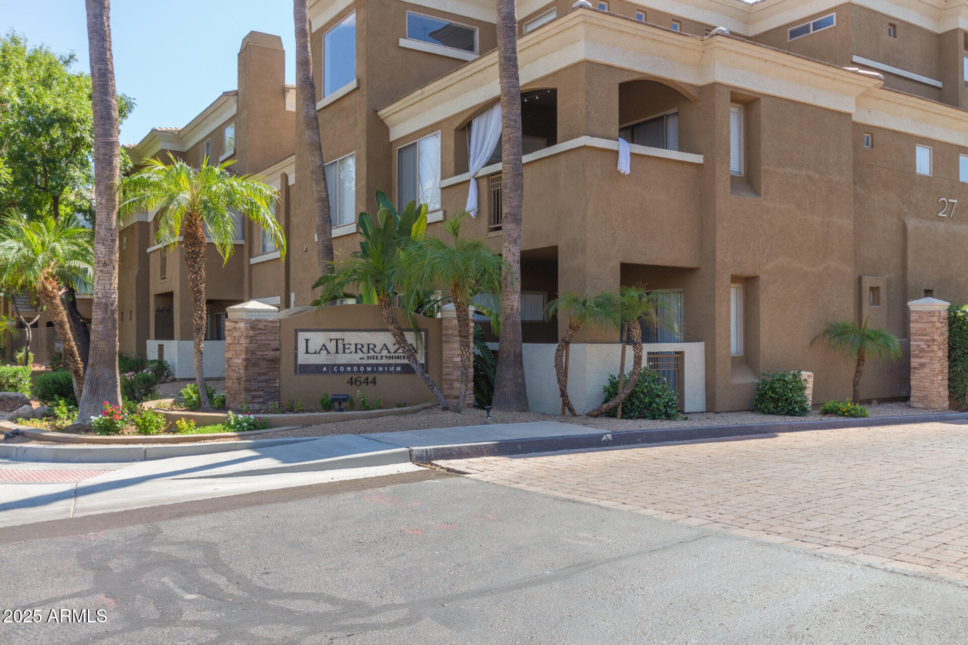 4644 North 22nd Street, Unit 1161 Phoenix, AZ 85016 - Photo 2 of 25 a view of entrance gate of a building