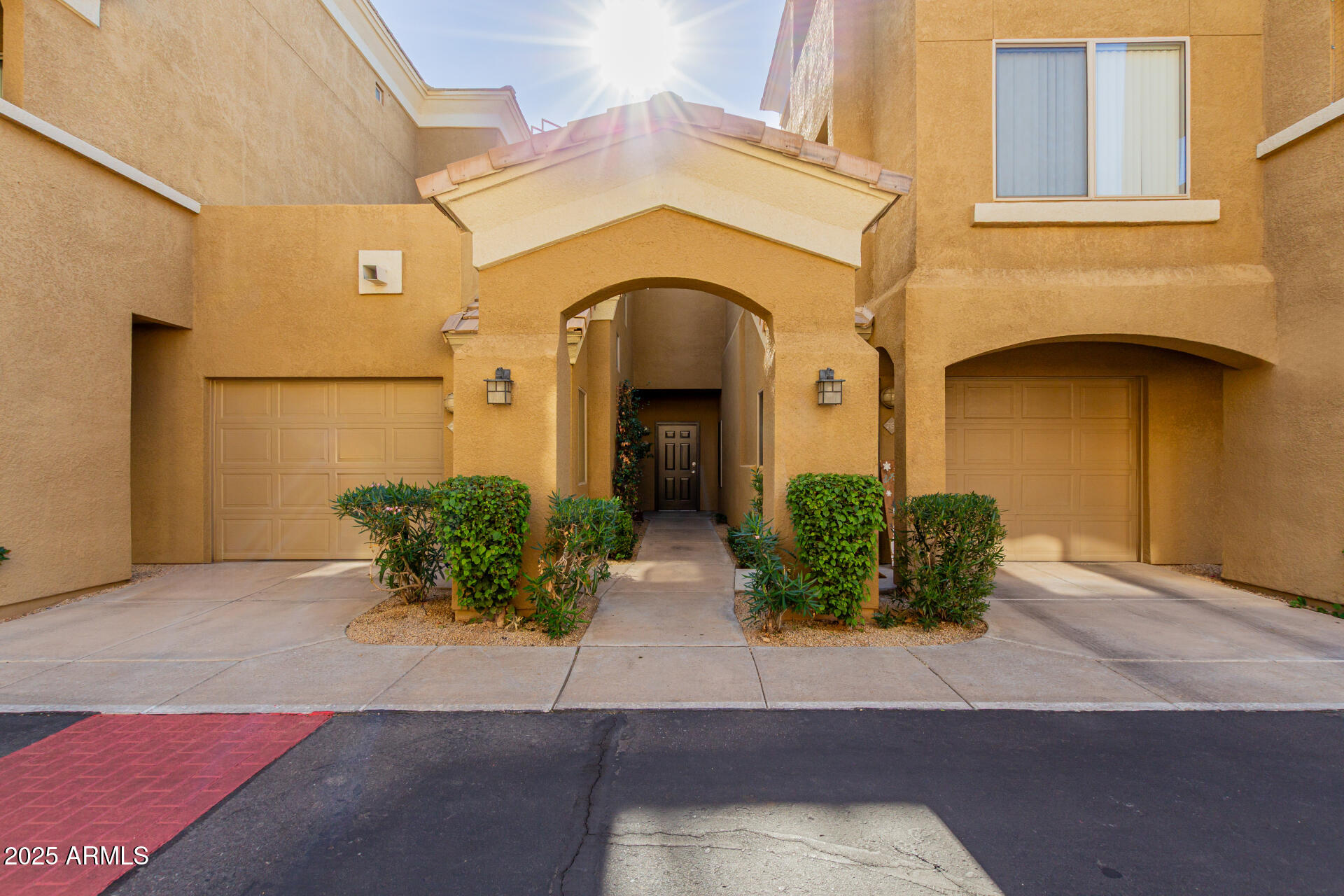 4644 North 22nd Street, Unit 1161 Phoenix, AZ 85016 - Photo 3 of 25 a front view of a house with garden