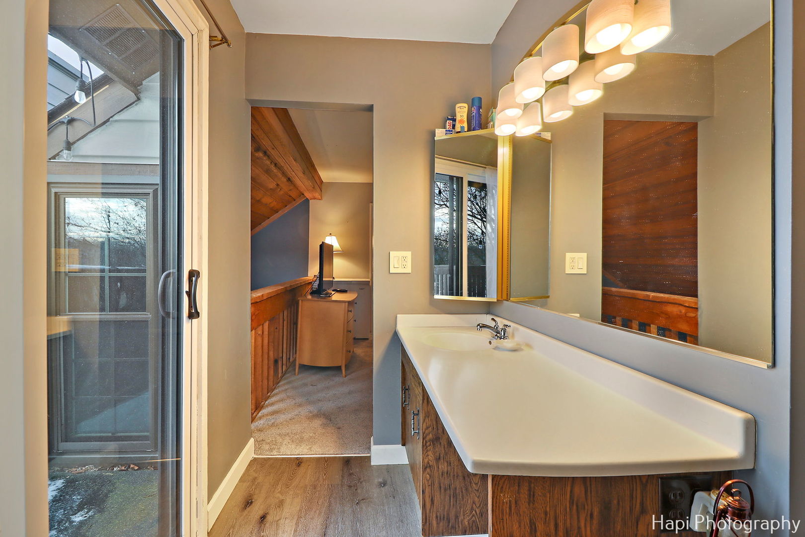734 Chandler Road Gurnee, IL 60031 - Photo 19 of 26 a en suite bathroom with a sink and mirror