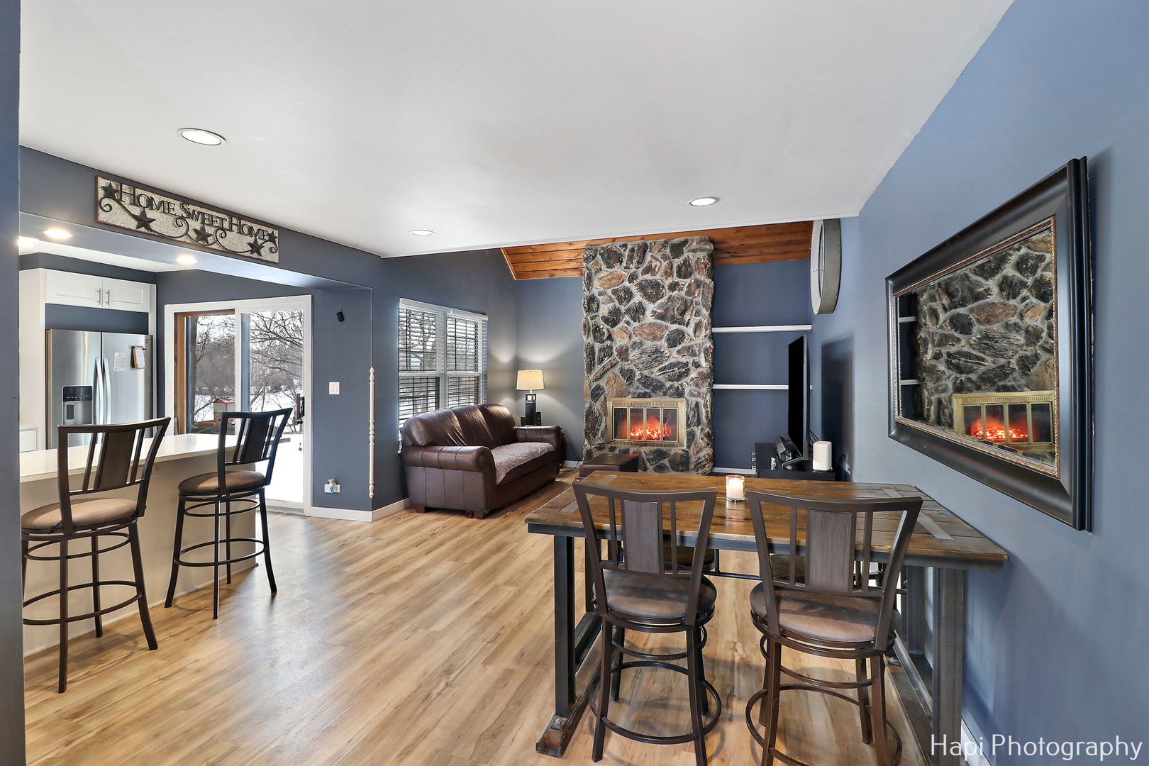 734 Chandler Road Gurnee, IL 60031 - Photo 3 of 26 a living room with furniture and a fireplace