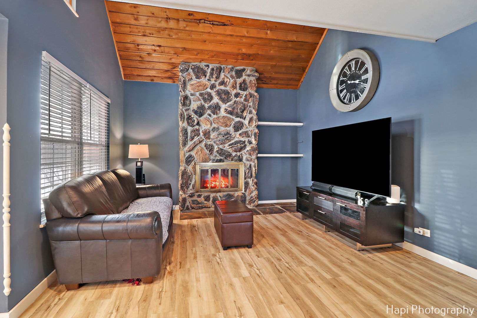 734 Chandler Road Gurnee, IL 60031 - Photo 5 of 26 a living room with furniture and a flat screen tv