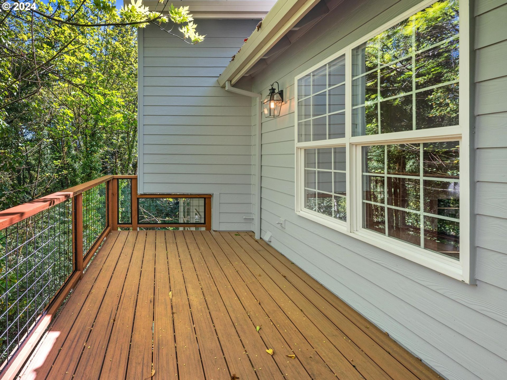 6254 Southwest Burlingame Avenue, Unit A Portland, OR 97239 - Photo 11 of 44 a view of a house with a large window