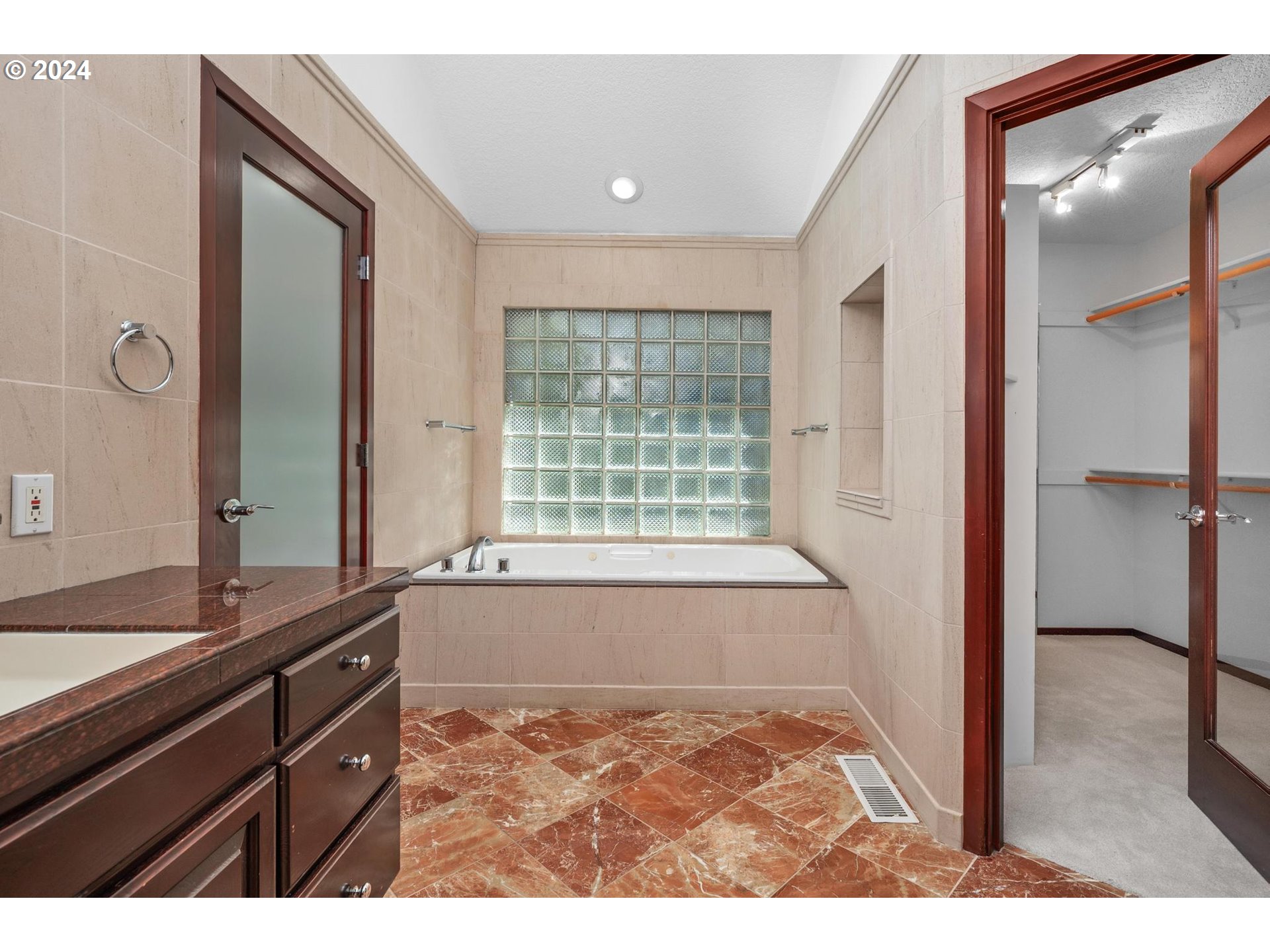 6254 Southwest Burlingame Avenue, Unit A Portland, OR 97239 - Photo 20 of 44 a bathroom with a bathtub and a sink