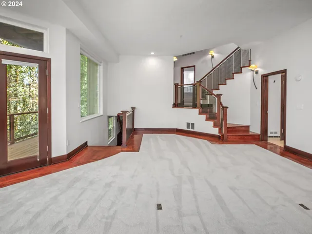 a view of balcony with wooden floor
