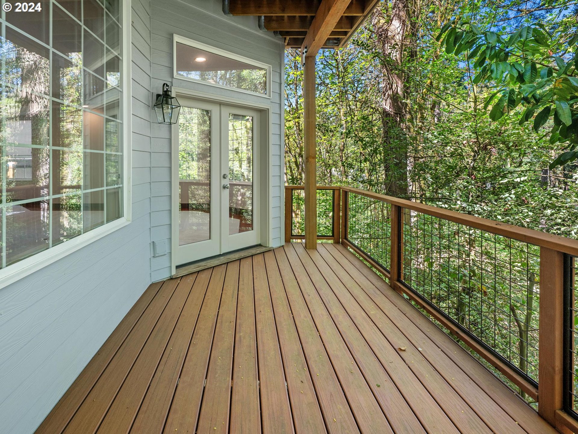 6254 Southwest Burlingame Avenue, Unit A Portland, OR 97239 - Photo 24 of 44 a view of balcony with wooden floor