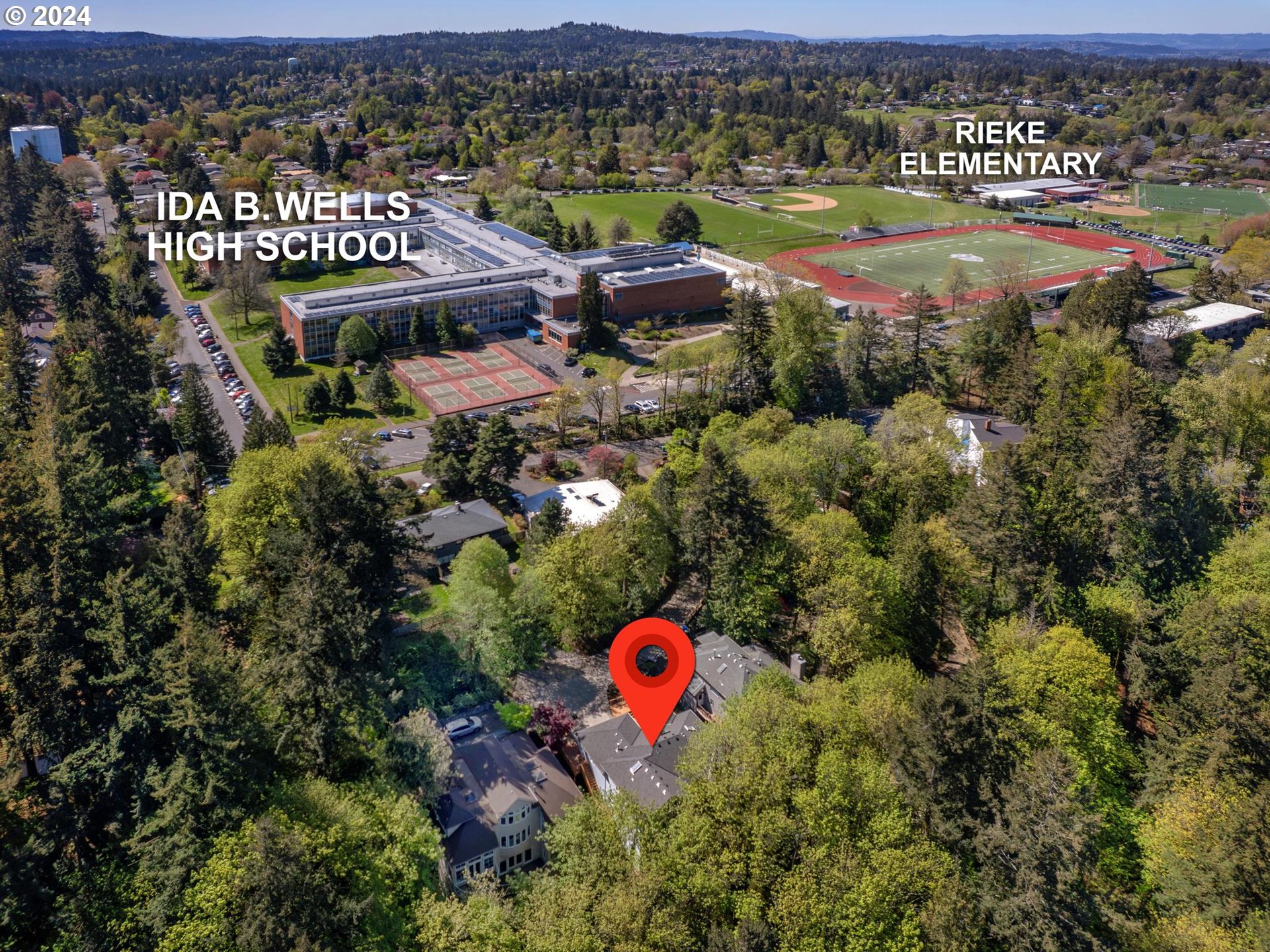6254 Southwest Burlingame Avenue, Unit A Portland, OR 97239 - Photo 40 of 44 an aerial view of a house with a garden and lake view