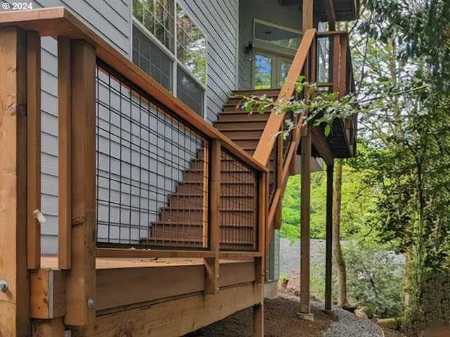 a view of a house with a tree