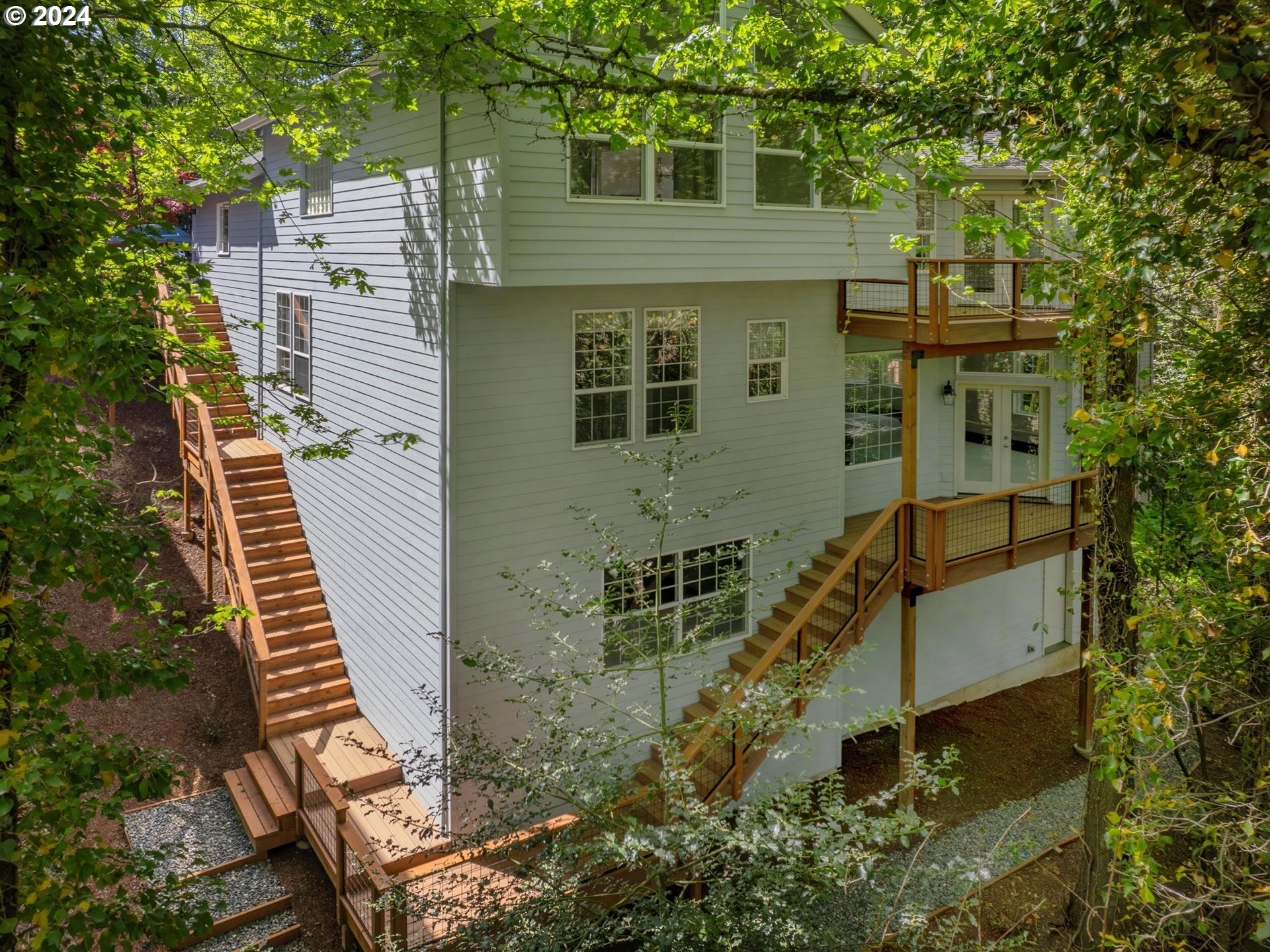 6254 Southwest Burlingame Avenue, Unit A Portland, OR 97239 - Photo 5 of 44 an aerial view of a house with a yard