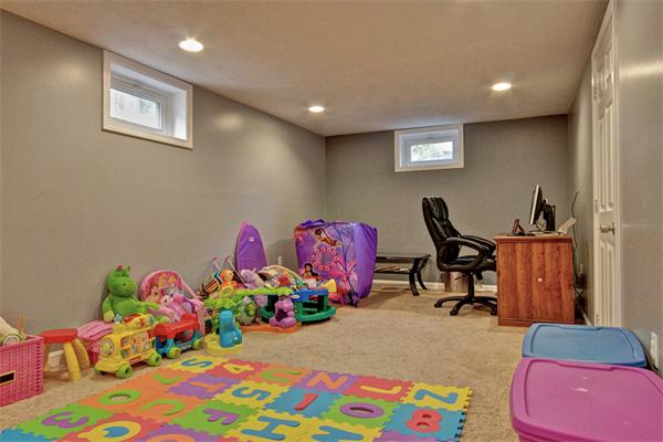 753 Potter Road Framingham, MA 01701 - Photo 21 of 25 a bedroom with furniture and a chair