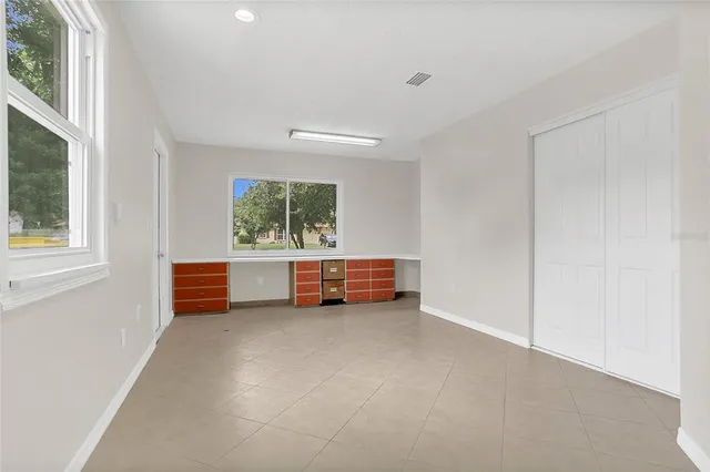 an empty room with windows