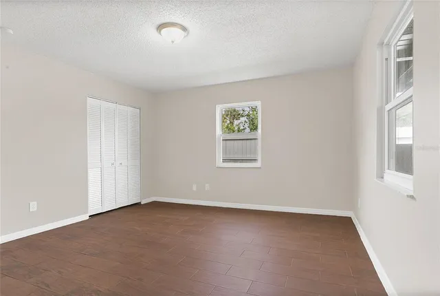 an empty room with windows