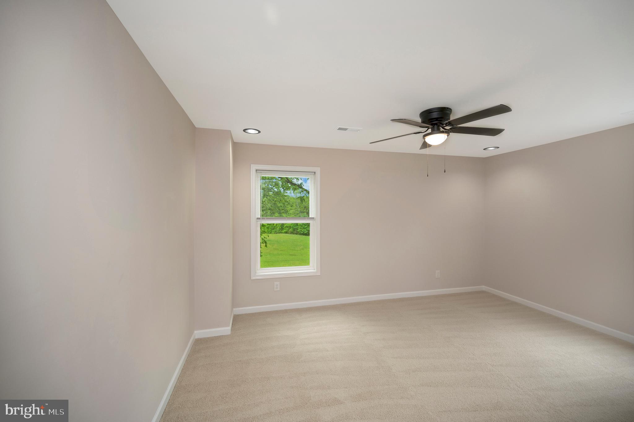 14169 Silver Hill Road Sumerduck, VA 22742 - Photo 28 of 40 an empty room with a window