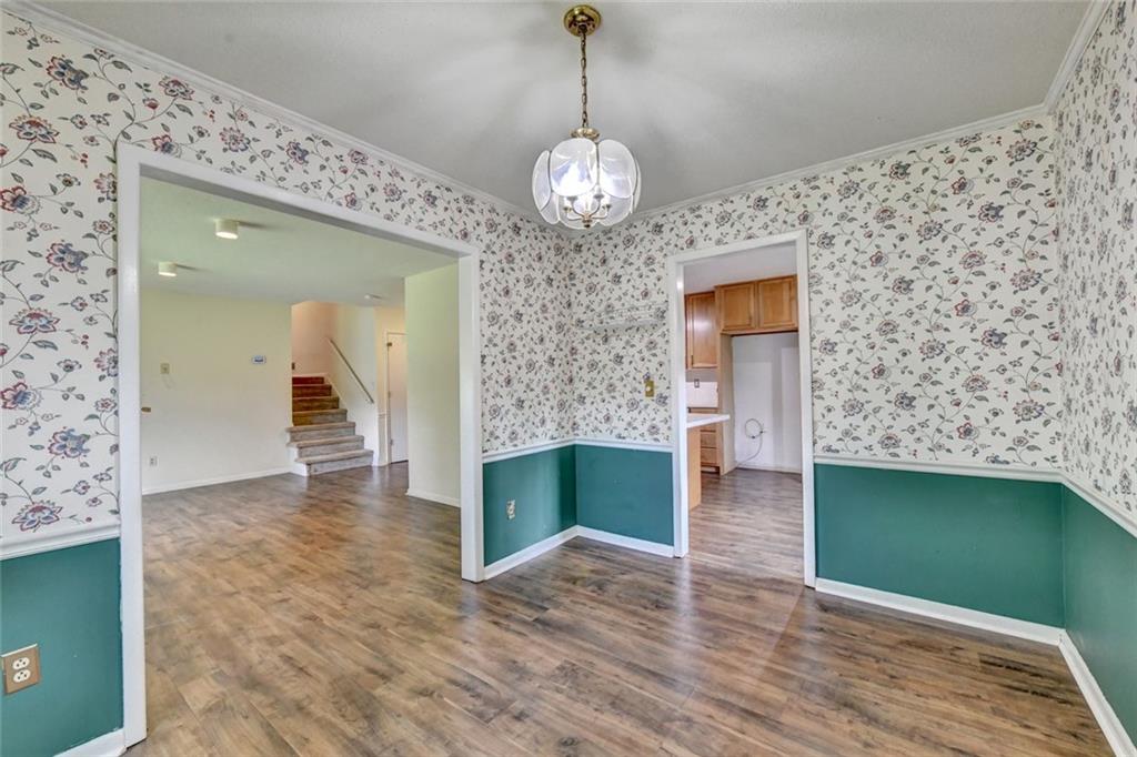 1577 Harbour Oaks Road Tucker, GA 30084 - Photo 14 of 58 a view of a livingroom with wooden floor and a fireplace