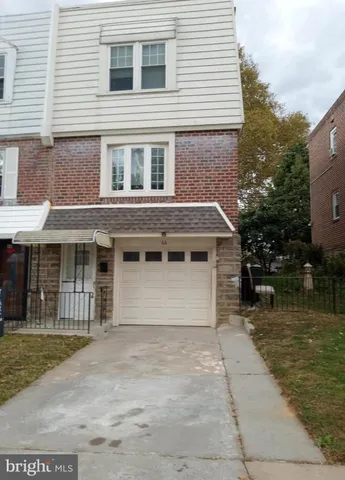 a house view with a garden space