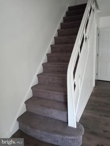 an empty room with closet area