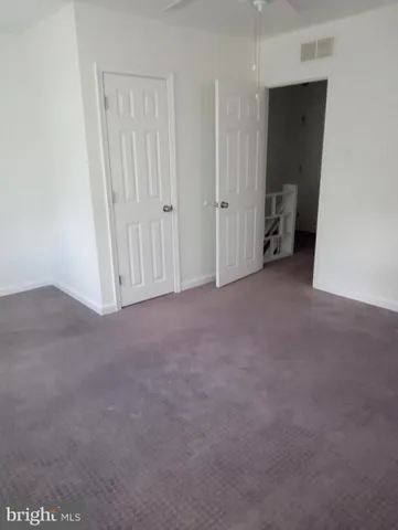 a view of a utility room with a sink