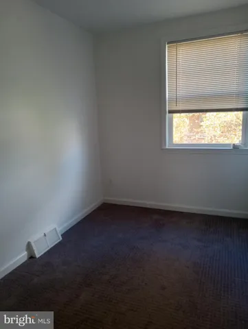 an empty room with a door