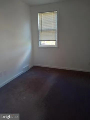 a bathroom with a toilet and a sink