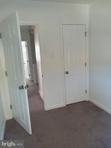 a bathroom with a toilet and a sink